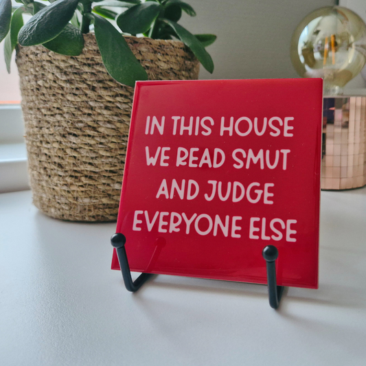 Tile “In This House We Read Smut And Judge Everyone Else”