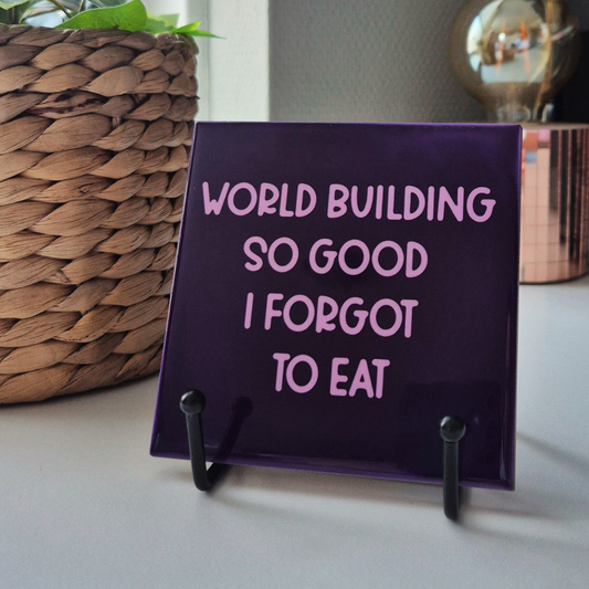 Tile “World Building So Good I Forgot To Eat.”